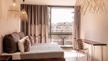 Standard Double Room, 2 Twin Beds, Partial Sea View | Minibar, in-room safe, desk, laptop workspace