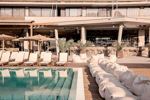 Indoor pool, seasonal outdoor pool, pool umbrellas, sun loungers