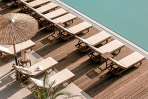 Indoor pool, seasonal outdoor pool, pool umbrellas, sun loungers