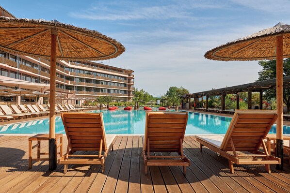 Indoor pool, seasonal outdoor pool, pool umbrellas, sun loungers