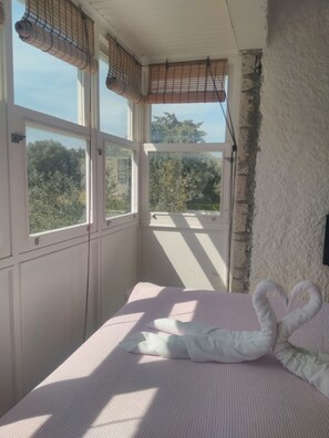 Panoramic Triple Room, Multiple Beds, Balcony, Courtyard View | Premium bedding, minibar, in-room safe, iron/ironing board