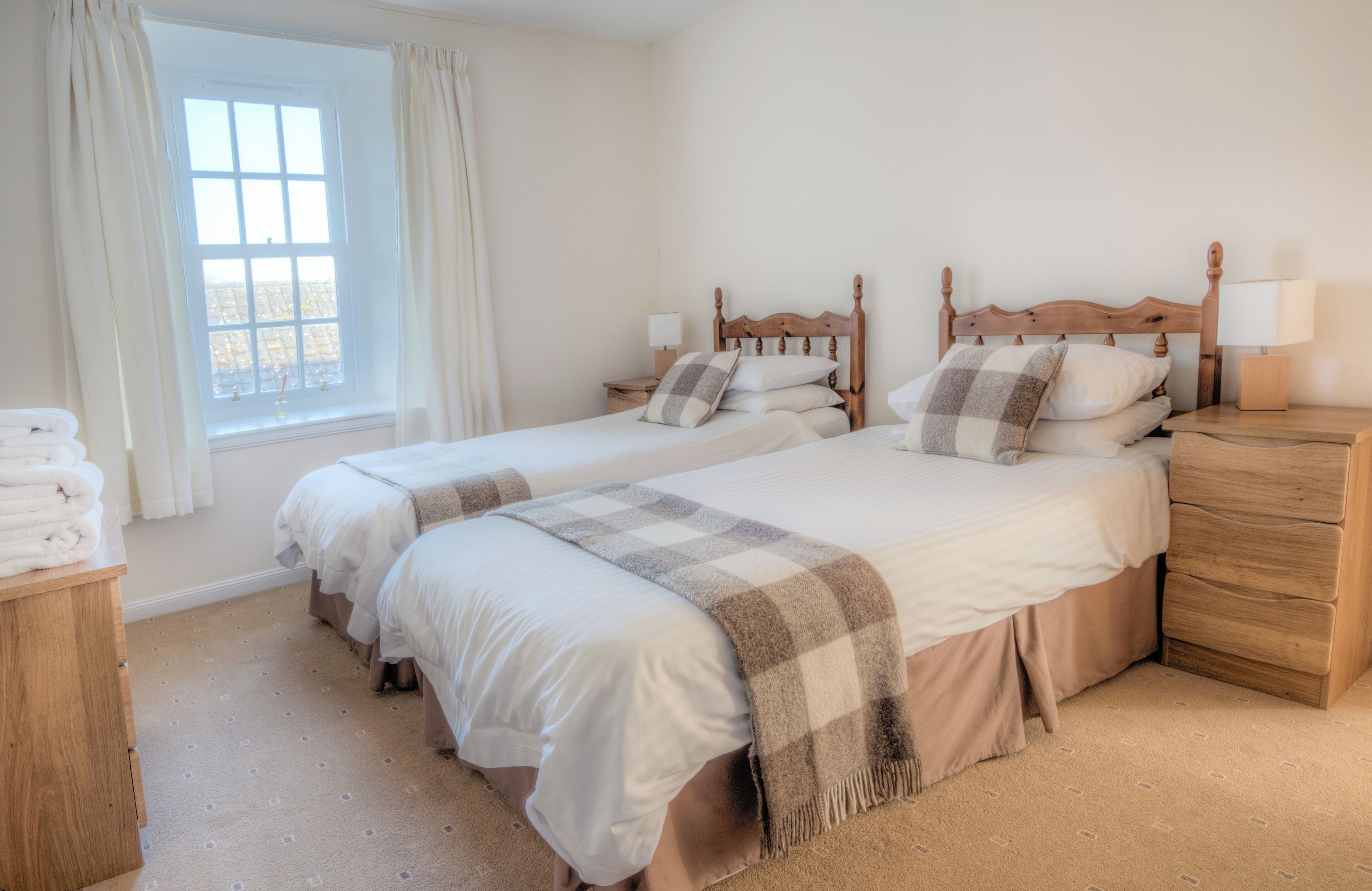 Basic House | Hypo-allergenic bedding, desk, laptop workspace, blackout curtains
