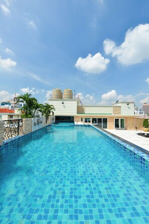 Outdoor pool, pool umbrellas, pool loungers