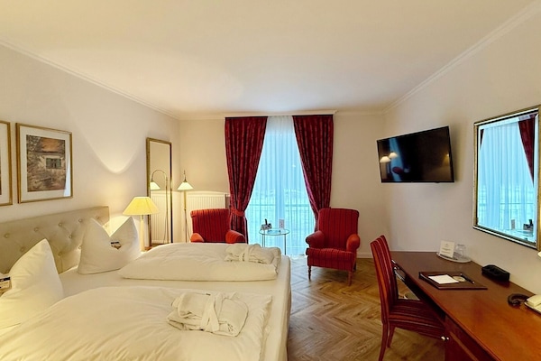 Desk, free WiFi, bed sheets