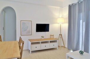 Apartment, 2 Bedrooms, Sea View | Living area | Flat-screen TV