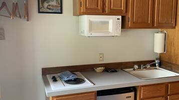 A - 1 Queen w/ Kitchenette | Private kitchen | Fridge, microwave
