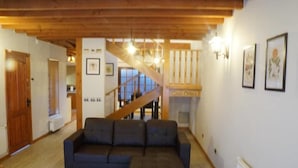 Standard Cottage, 3 Bedrooms | Living area | Flat-screen TV - Cabañas del Teatro (Frutillar)