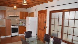 Standard Cottage, 3 Bedrooms | Private kitchen | Fridge, microwave, stovetop, cookware/dishes/utensils - Cabañas del Teatro (Frutillar)