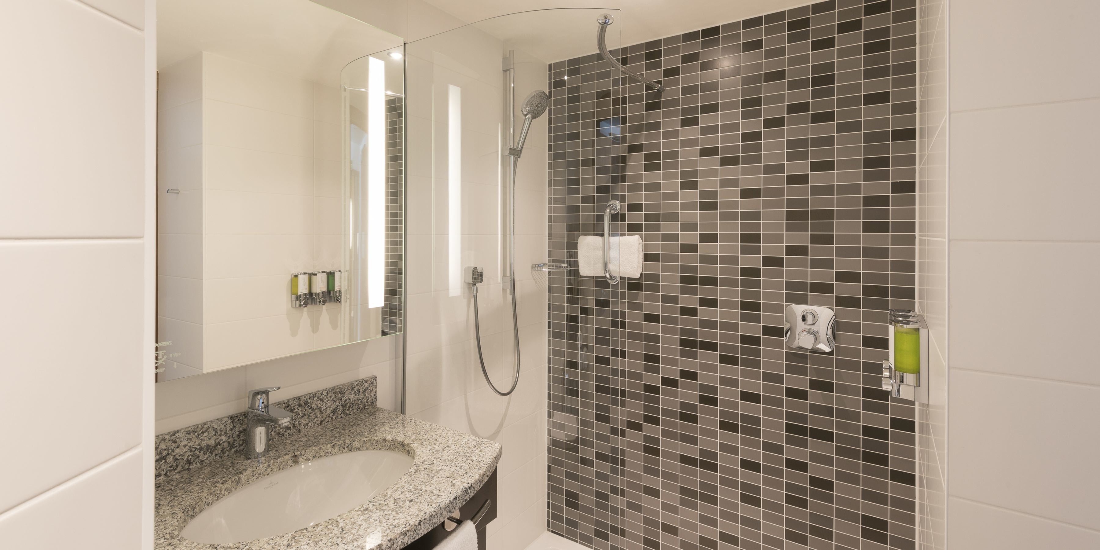 shower, free toiletries, hair dryer, towels