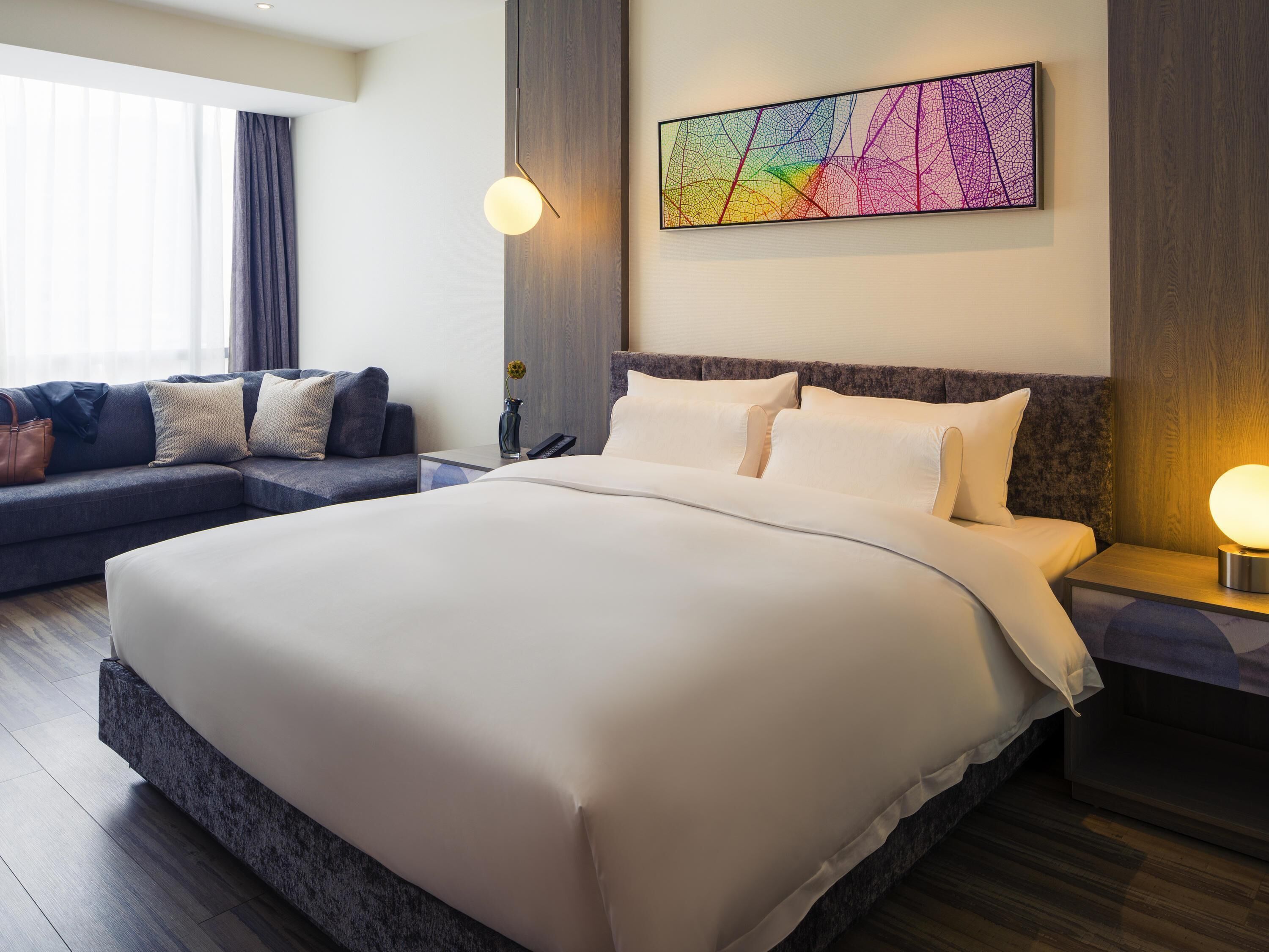 Deluxe kamer, 1 kingsize bed | Luxe beddengoed, donsdekens, pillowtop-bedden, een gratis minibar