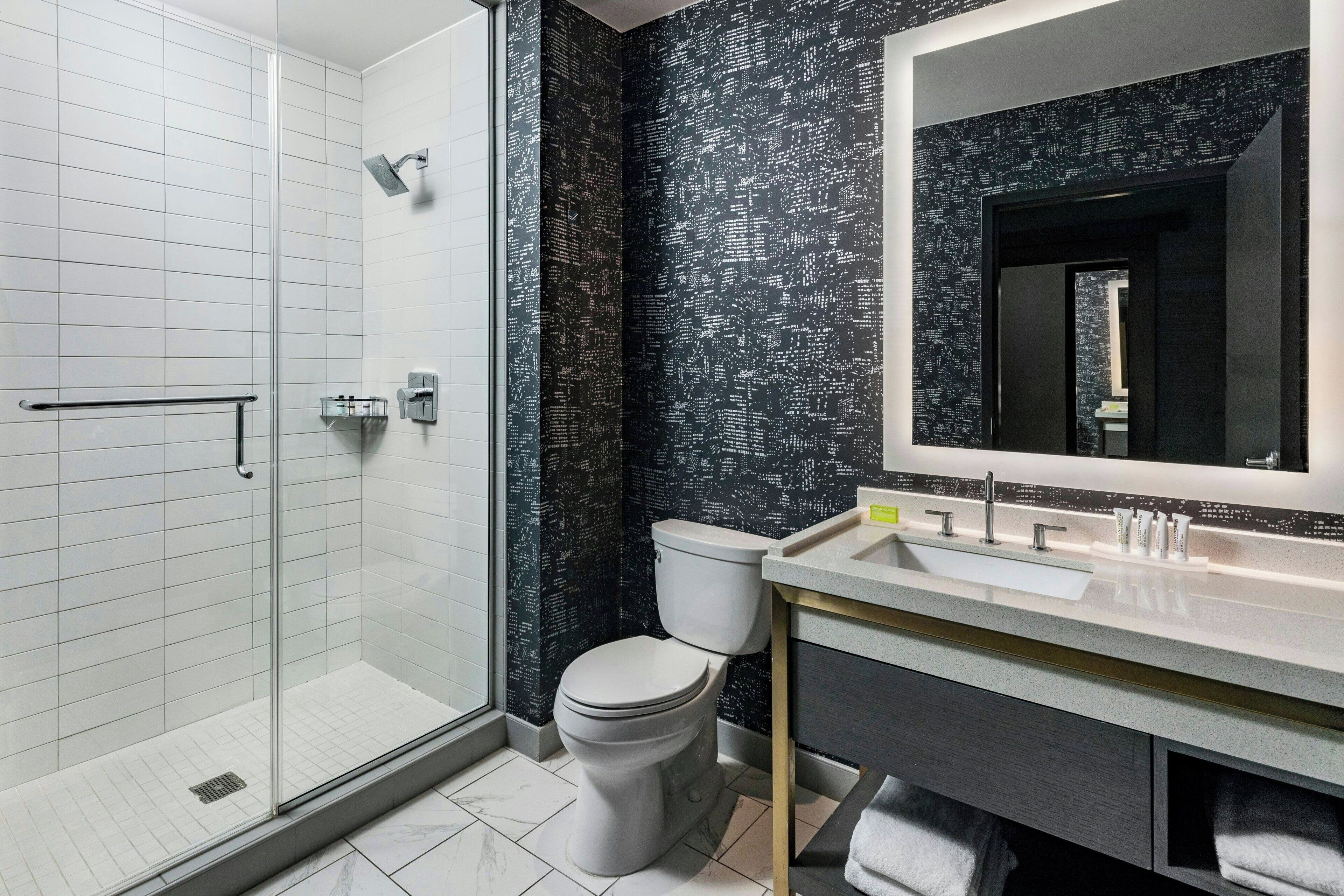 combined shower/bathtub, free toiletries, hair dryer, bathrobes