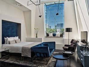 Suite, 1 cama Queen size, vista a la ciudad | Ropa de cama de alta calidad y minibar 