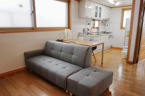 Family Apartment, 2 Bedrooms, Kitchen | Living area | 42-inch flat-screen TV with cable channels, TV - Hongdae One House (Seoul)