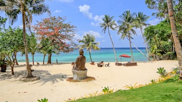 On the beach, white sand, free beach shuttle, sun loungers