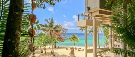On the beach, white sand, free beach shuttle, sun loungers