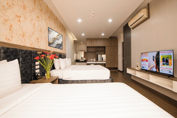 Tremannsrom – familie, ikke-røyk, aircondition | Minibar, skrivebord, wi-fi (inkludert) og sengetøy