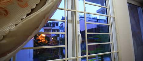 Duplex, em dormitório misto, vista para a cidade | Vista do quarto
