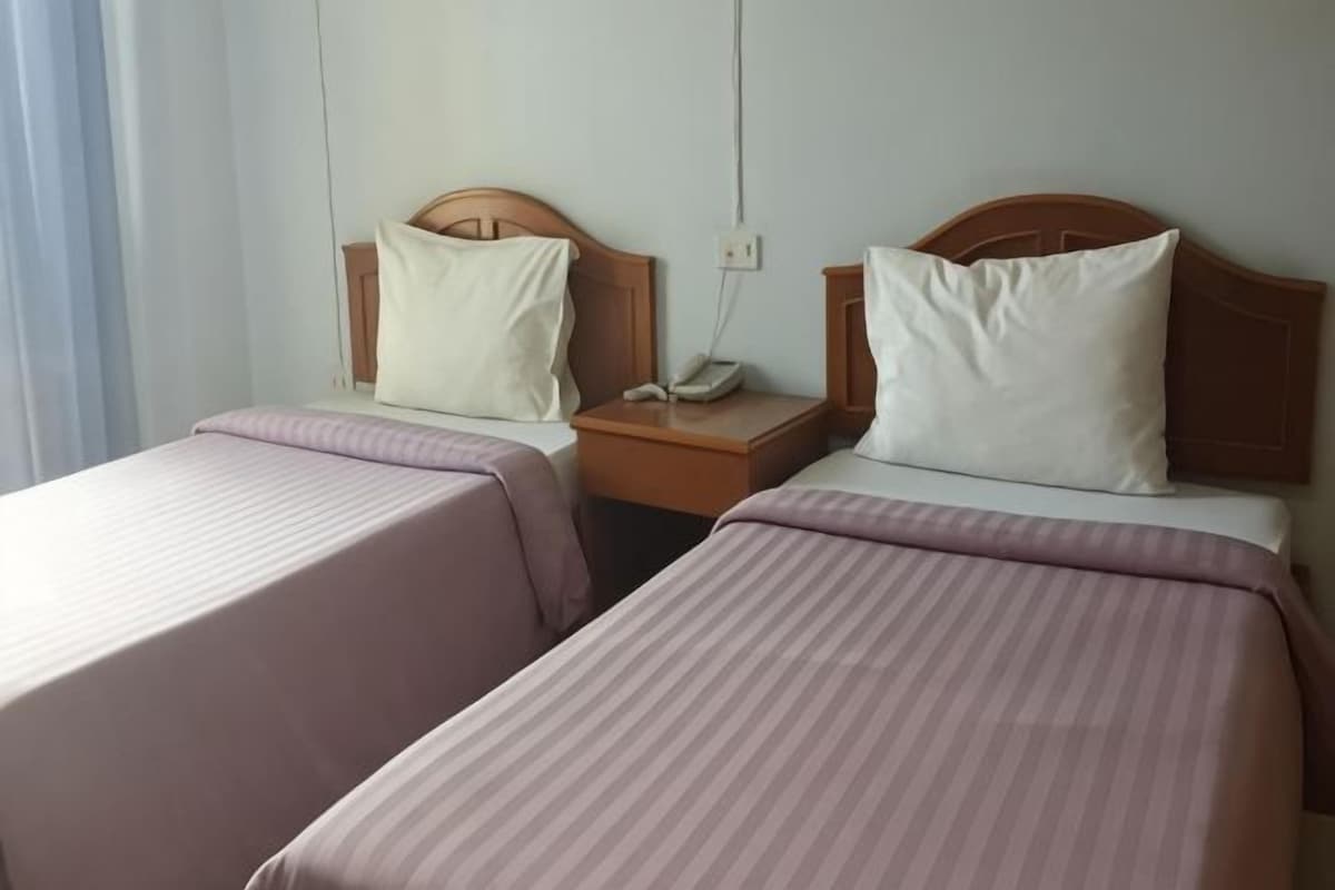 Blackout drapes, rollaway beds (surcharge), WiFi (free)