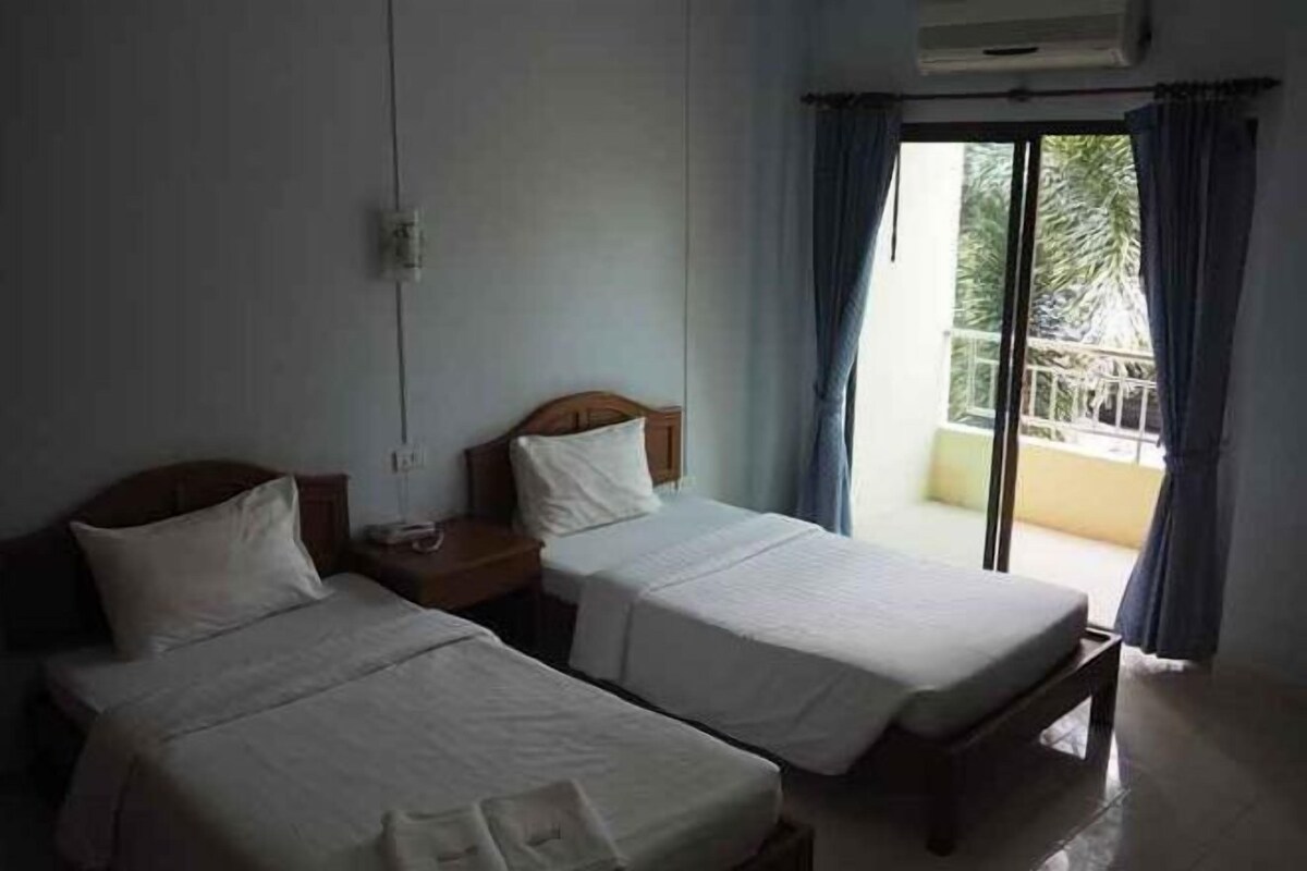 Blackout drapes, rollaway beds (surcharge), WiFi (free)