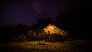 A house with a balcony under a starry night sky. - Ahaspokuna by Eco Team (Balangoda)