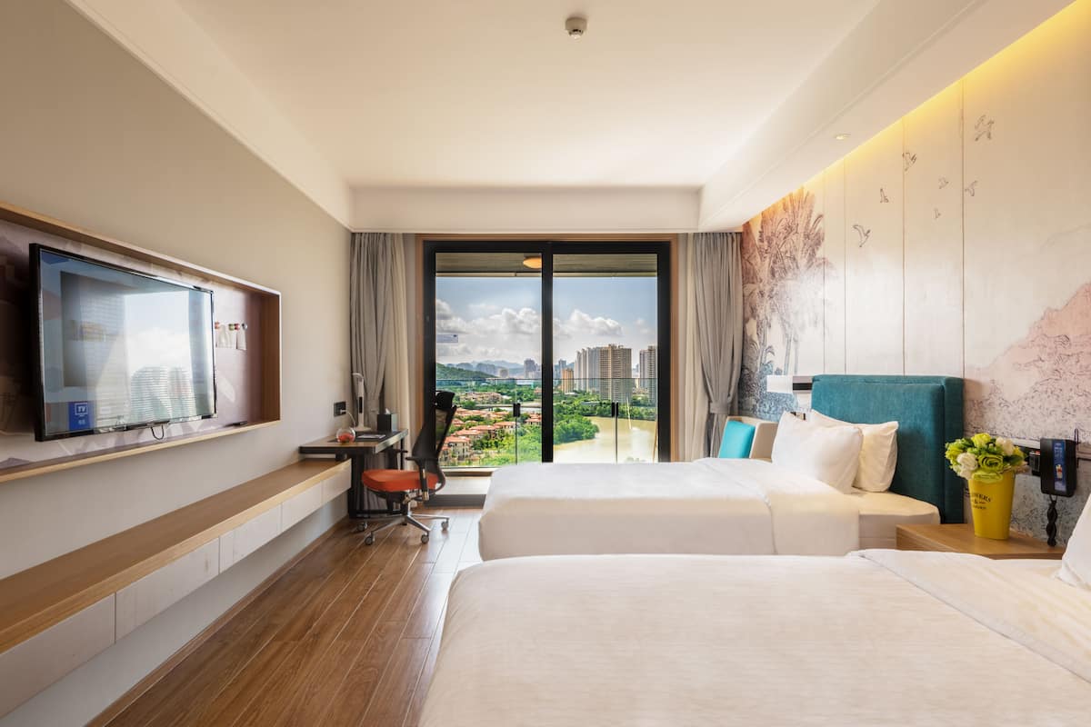 comfort twin room, river view | minibar, desk, iron/ironing board, free wifi