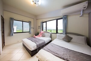 Quadruple Room | Individually decorated, individually furnished, blackout drapes