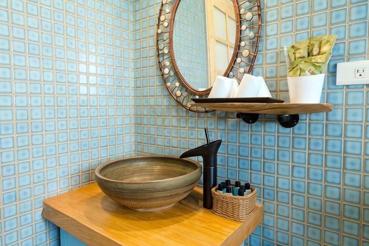 Bathroom | Shower, free toiletries, hair dryer, slippers