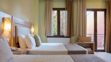 Standard Quadruple Room | Individually decorated, individually furnished, desk, blackout drapes