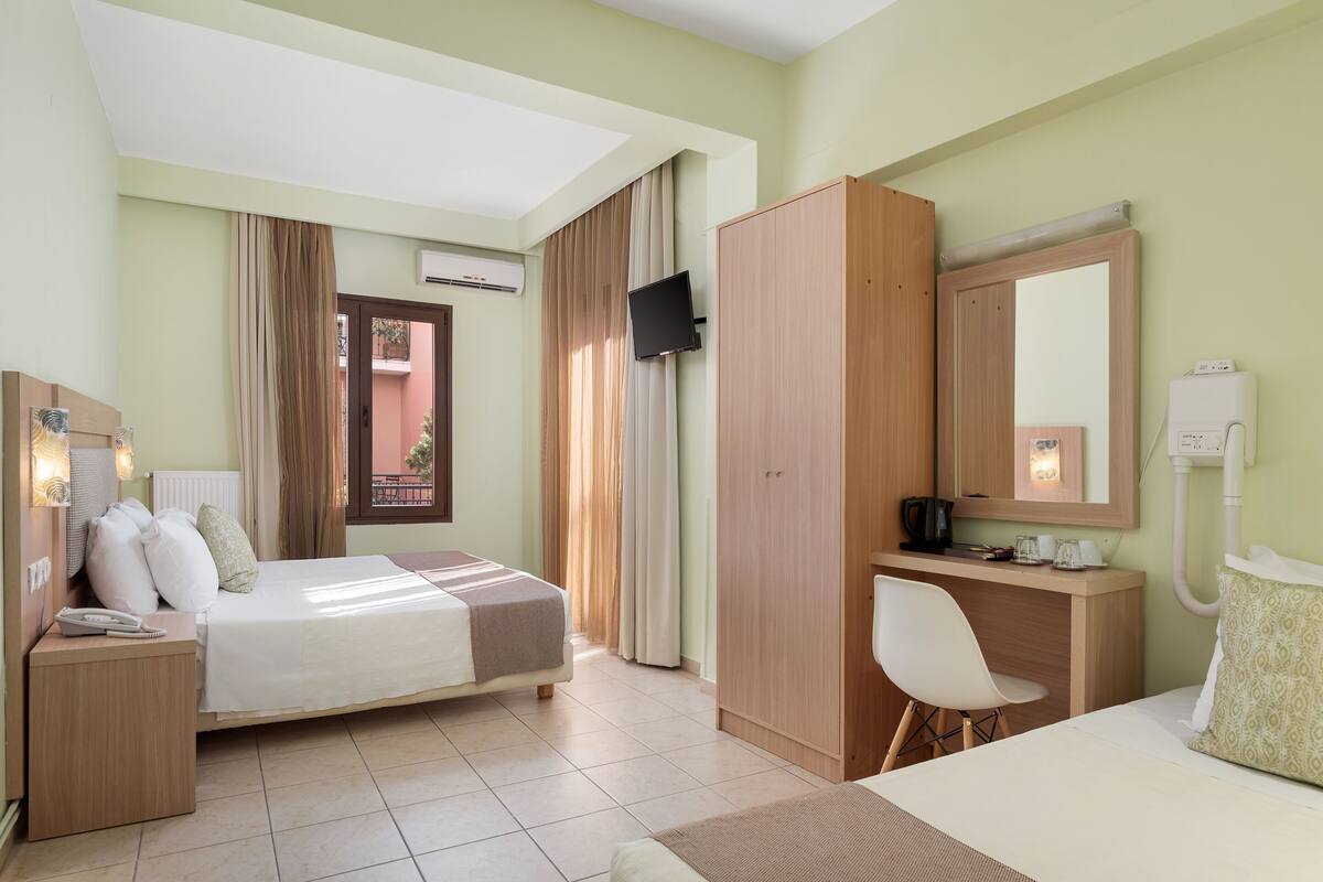 Standard Triple Room | Individually decorated, individually furnished, desk, blackout drapes