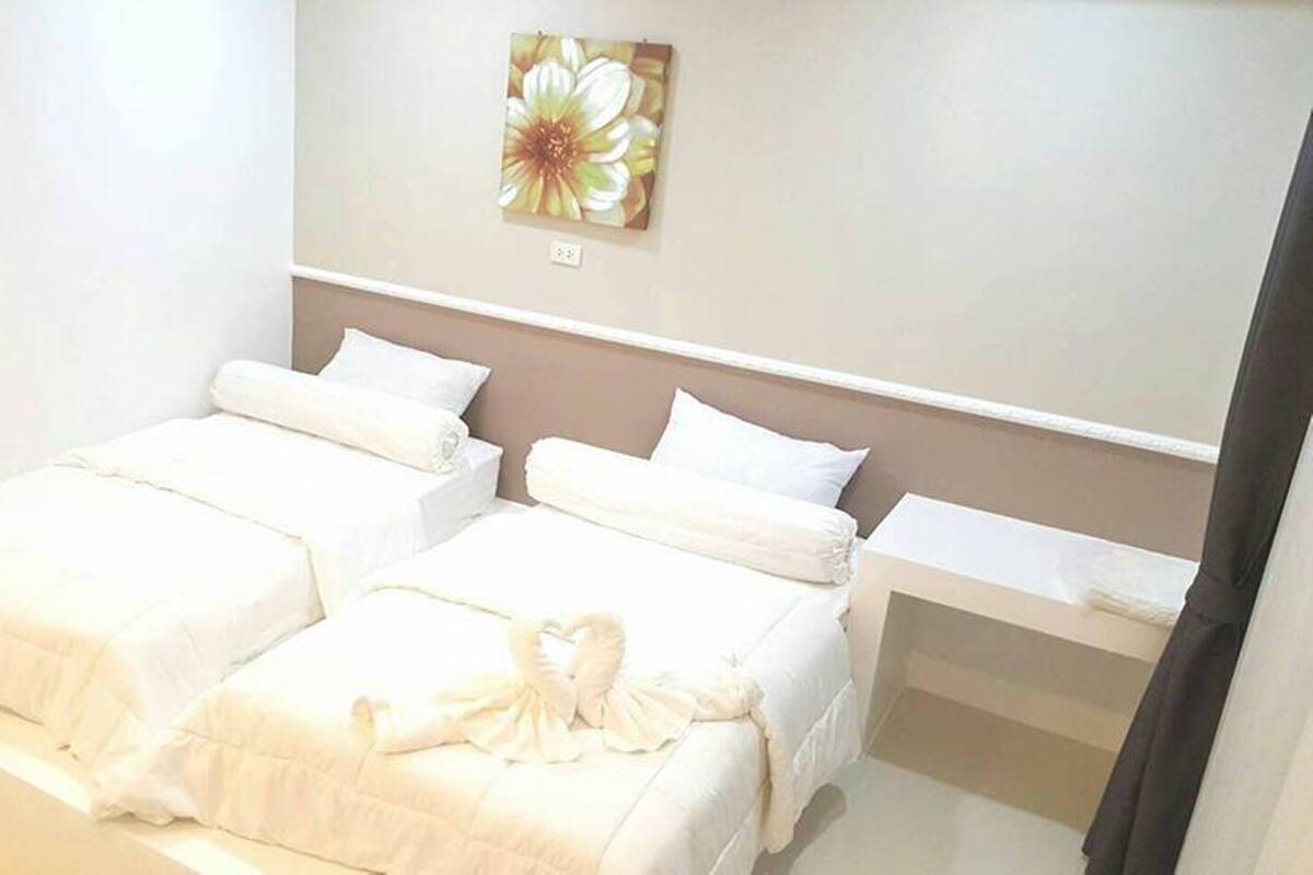 Desk, blackout curtains, rollaway beds, free WiFi