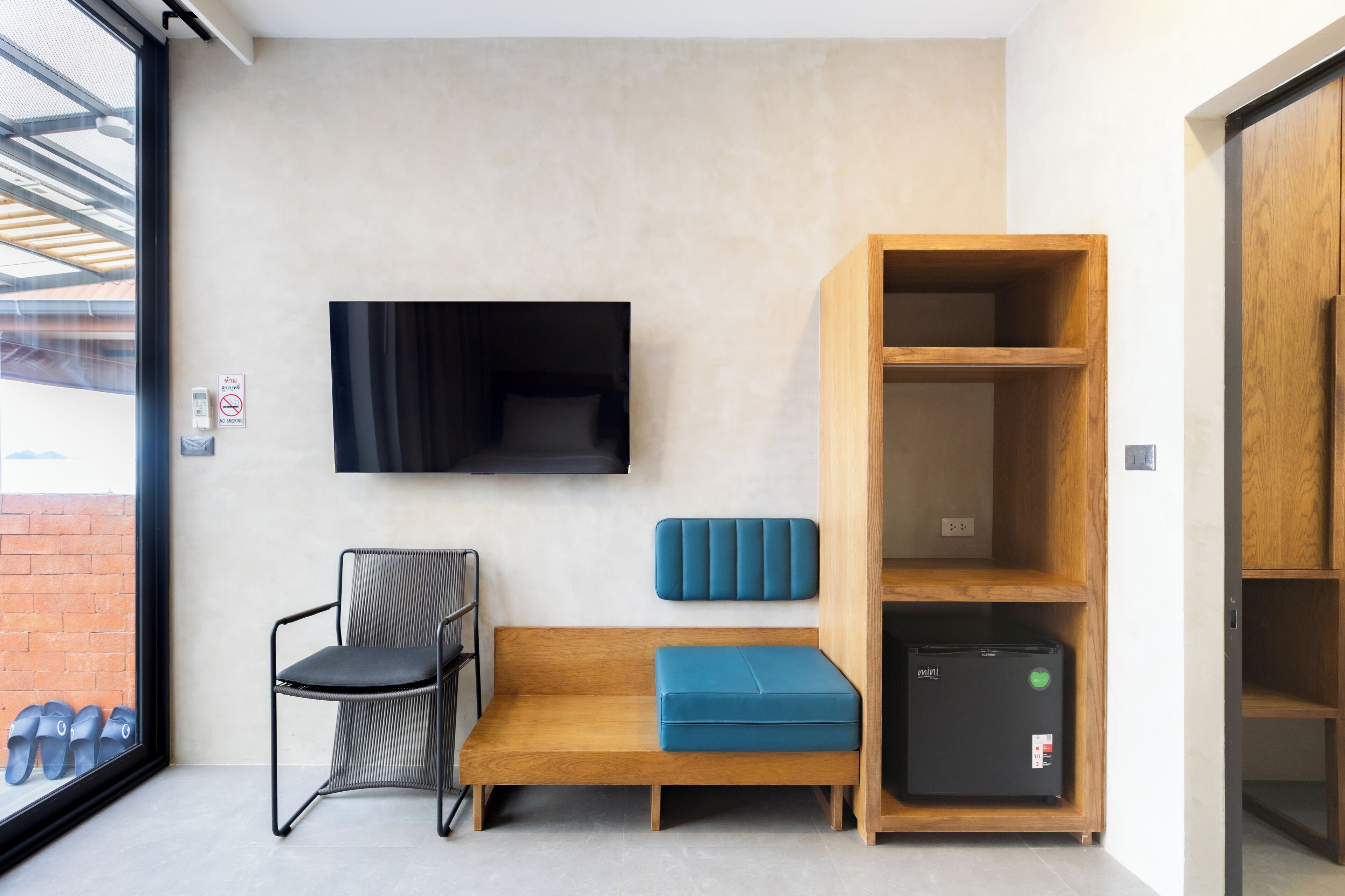 pier117 private ocean front villa at sea | living area | 32-inch smart tv with digital channels