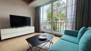 203 The Supreme Seaview: Beach Zone | Living area | 32-inch Smart TV with digital channels