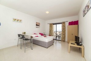 Studio, vue océan | Salle de séjour