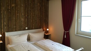 Apartemen, 1 kamar tidur, dapur kecil, pemandangan kebun (Lutki) | Seprai antialergi, kedap suara, dan tempat tidur bayi gratis