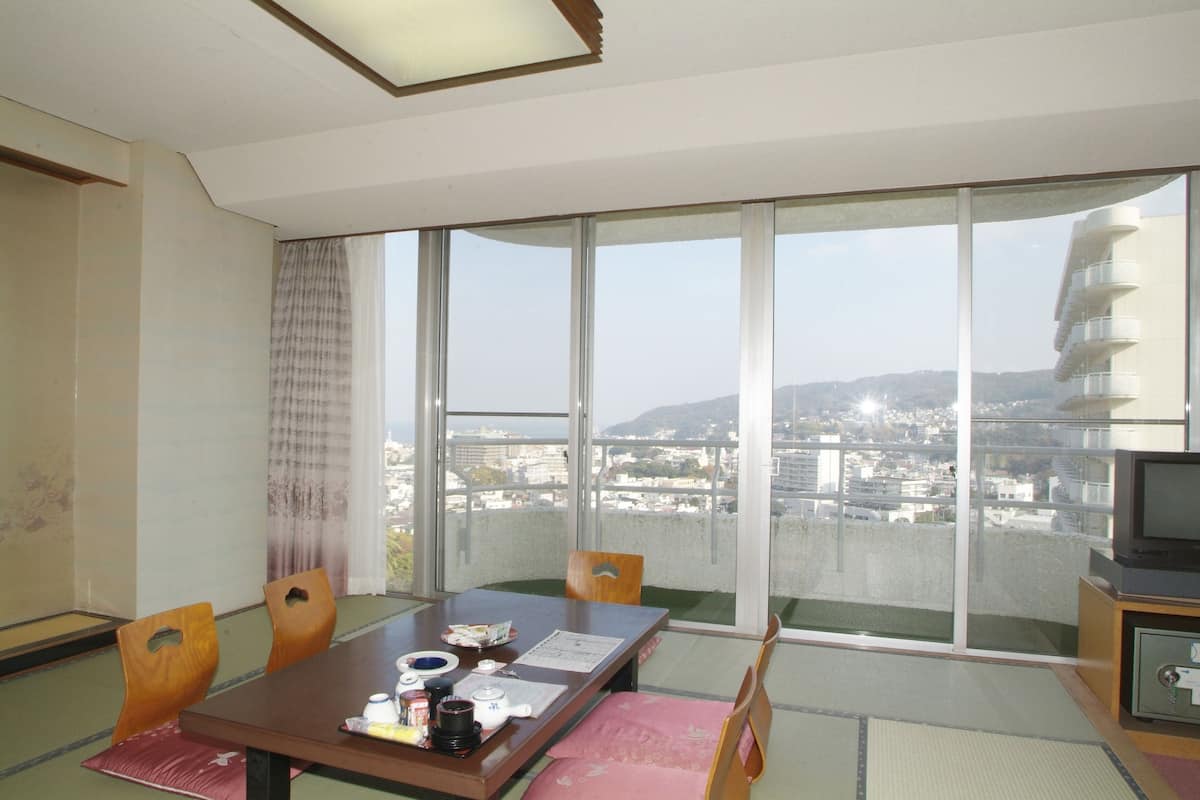 Standard Quadruple Room, Smoking | Premium bedding, in-room safe, desk, laptop workspace