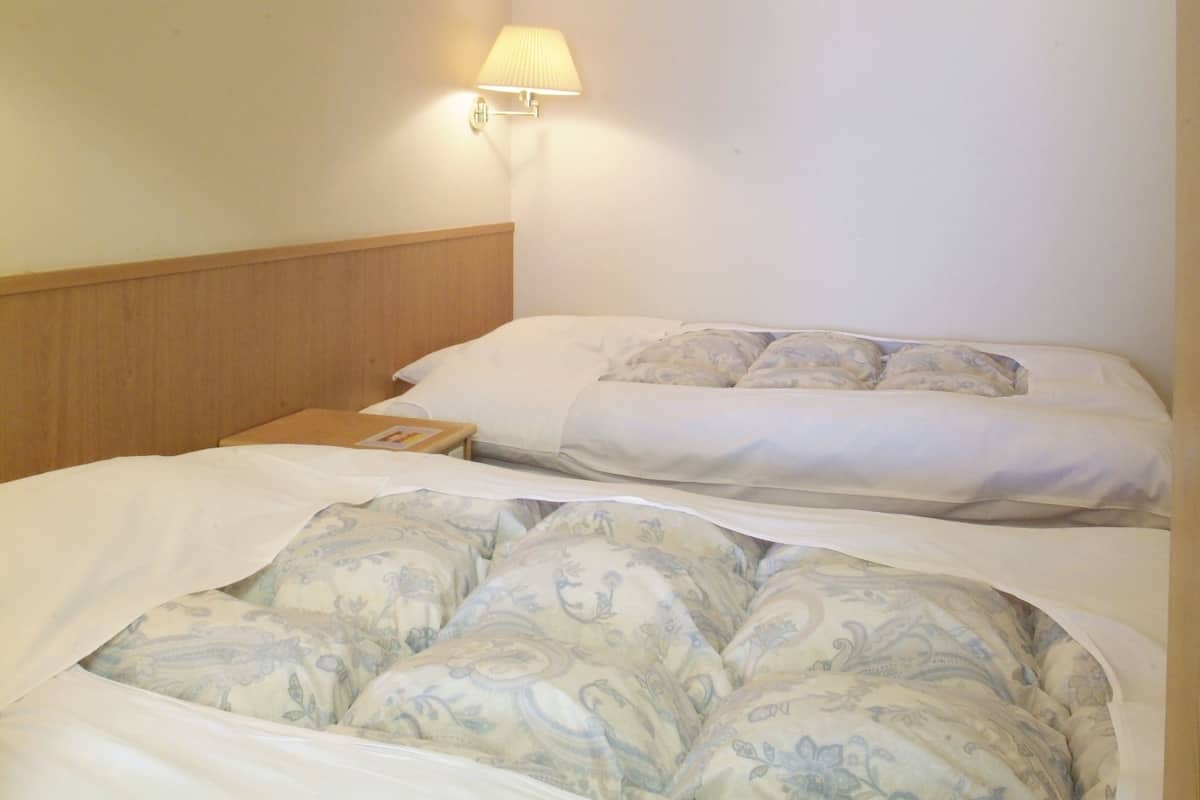 Deluxe Room with Tatami Area, Non Smoking | Premium bedding, in-room safe, desk, laptop workspace