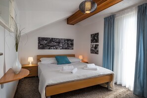 Deluxe Apartment, 1 Bedroom, Balcony, Sea View | Desk, iron/ironing board, free WiFi