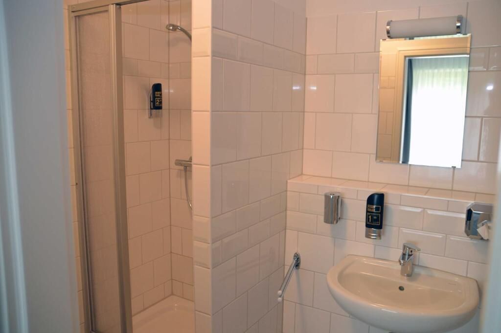 Appartamento | Bagno | Doccia, set di cortesia gratuito, asciugacapelli, asciugamani