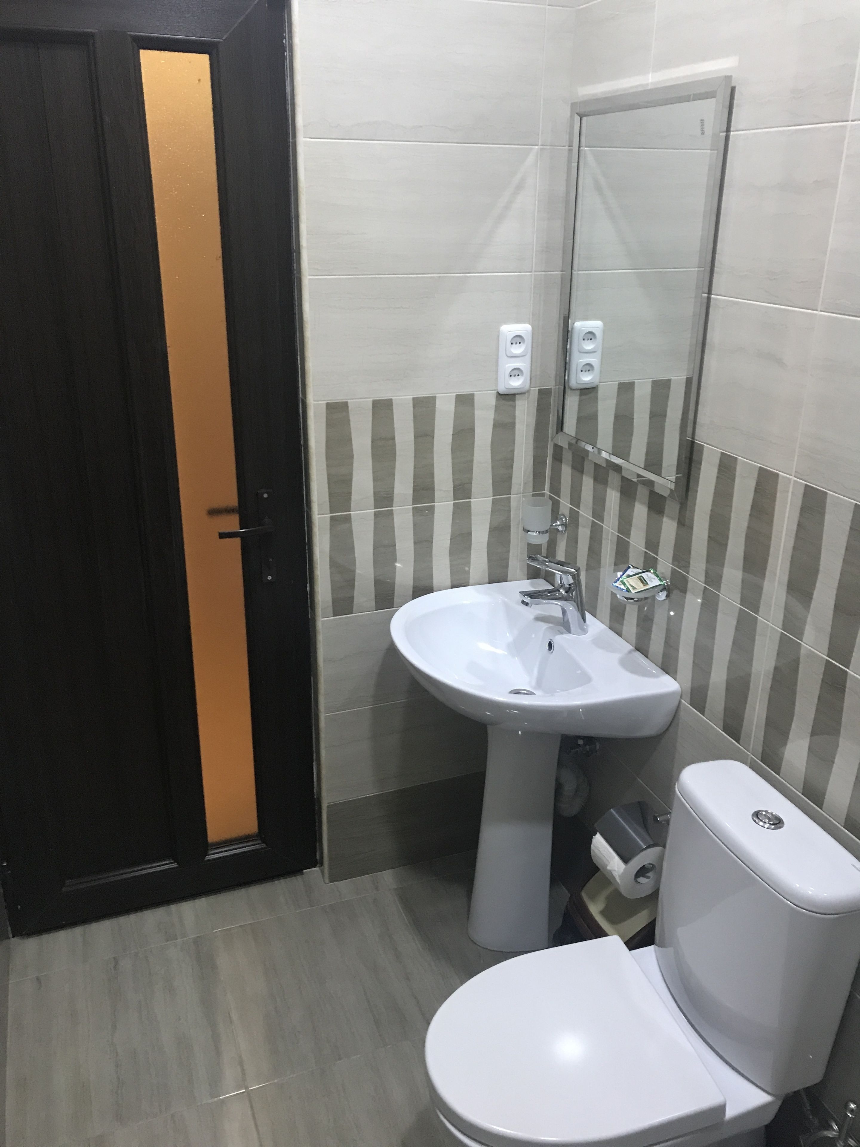 shower, free toiletries, slippers, towels