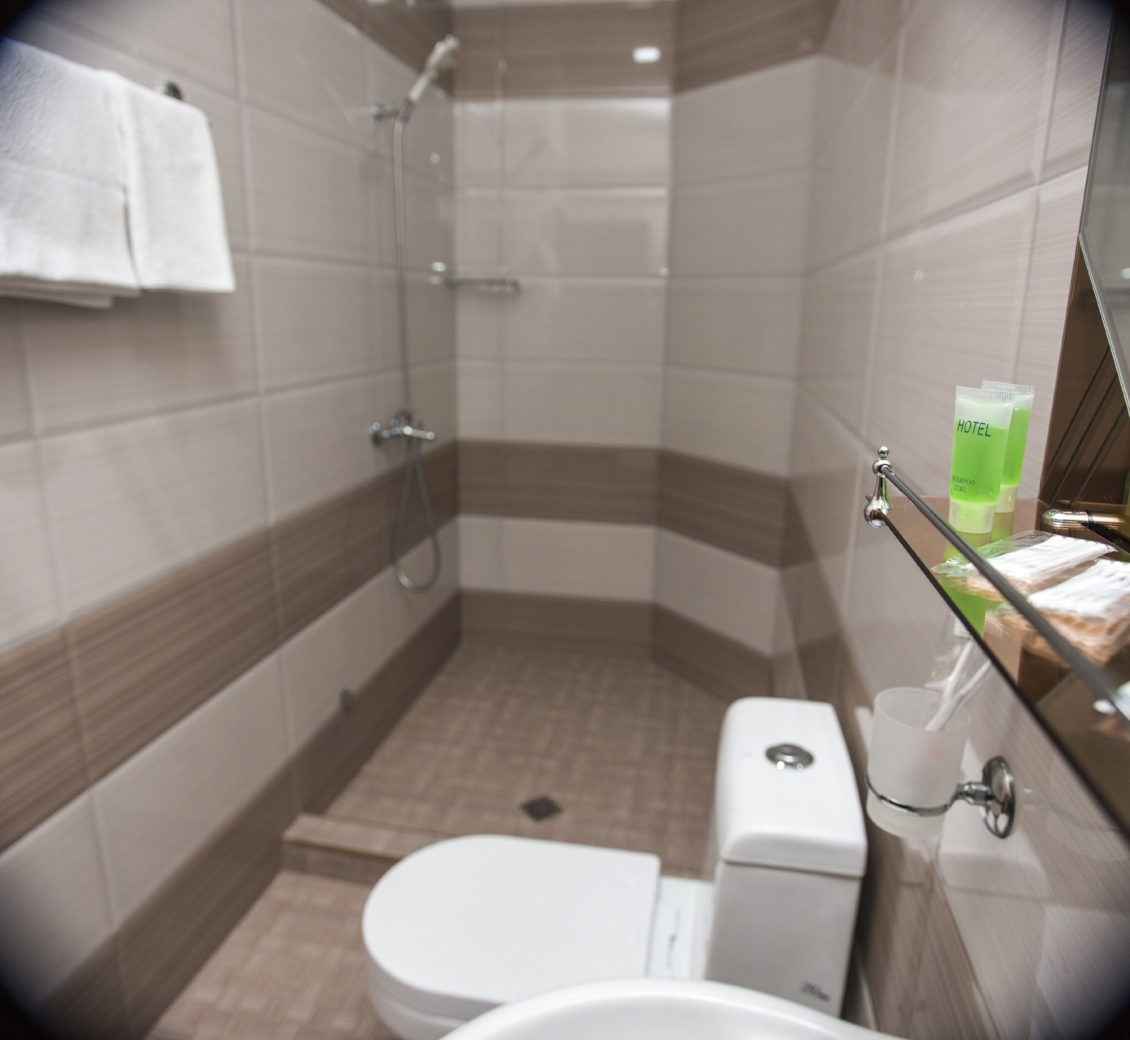 standard double or twin room | bathroom | shower, free toiletries, slippers, towels