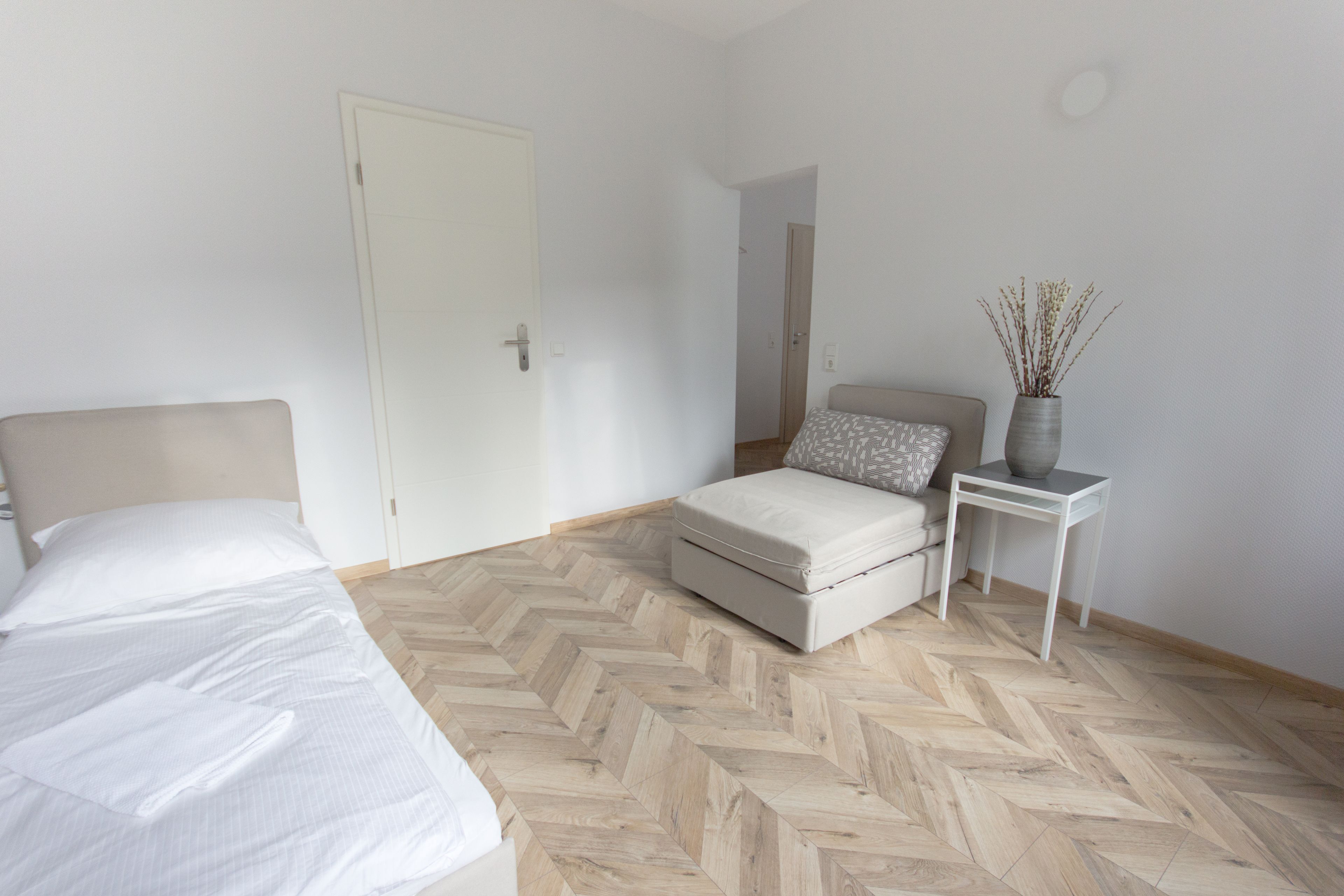 quadruple room, non smoking, city view | frette italian sheets, premium bedding, down duvets, soundproofing