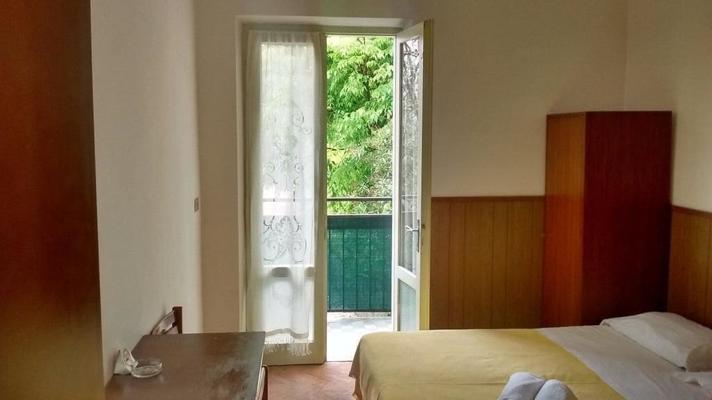 triple room, partial lake view | desk, free cots/infant beds, free wifi, bed sheets