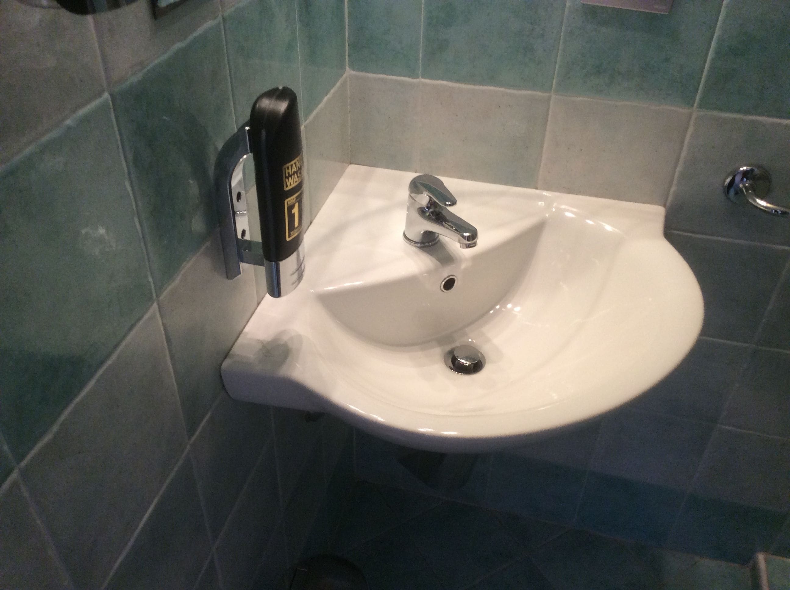 double room, partial lake view | bathroom sink