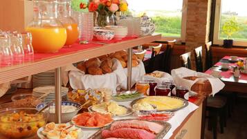 Daily buffet breakfast (EUR 18 per person)