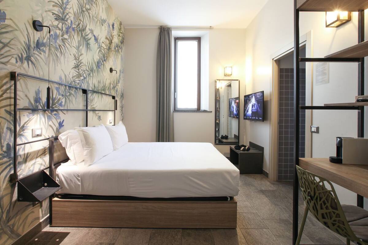 Standard Double Room, 1 Double Bed, Private Bathroom, Ground Floor | Minibar, in-room safe, desk, laptop workspace