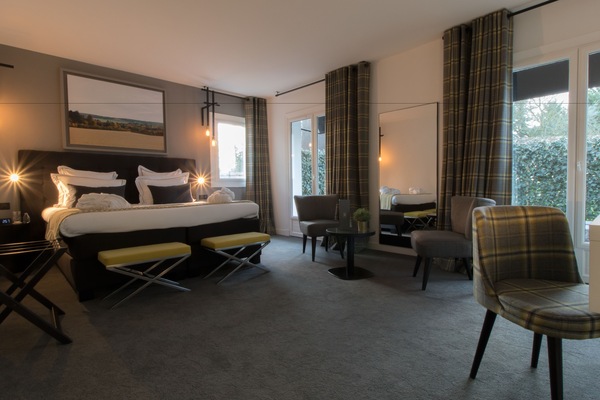 Suite Deluxe, 1 cama King size | Ropa de cama de alta calidad y caja de seguridad en la habitación