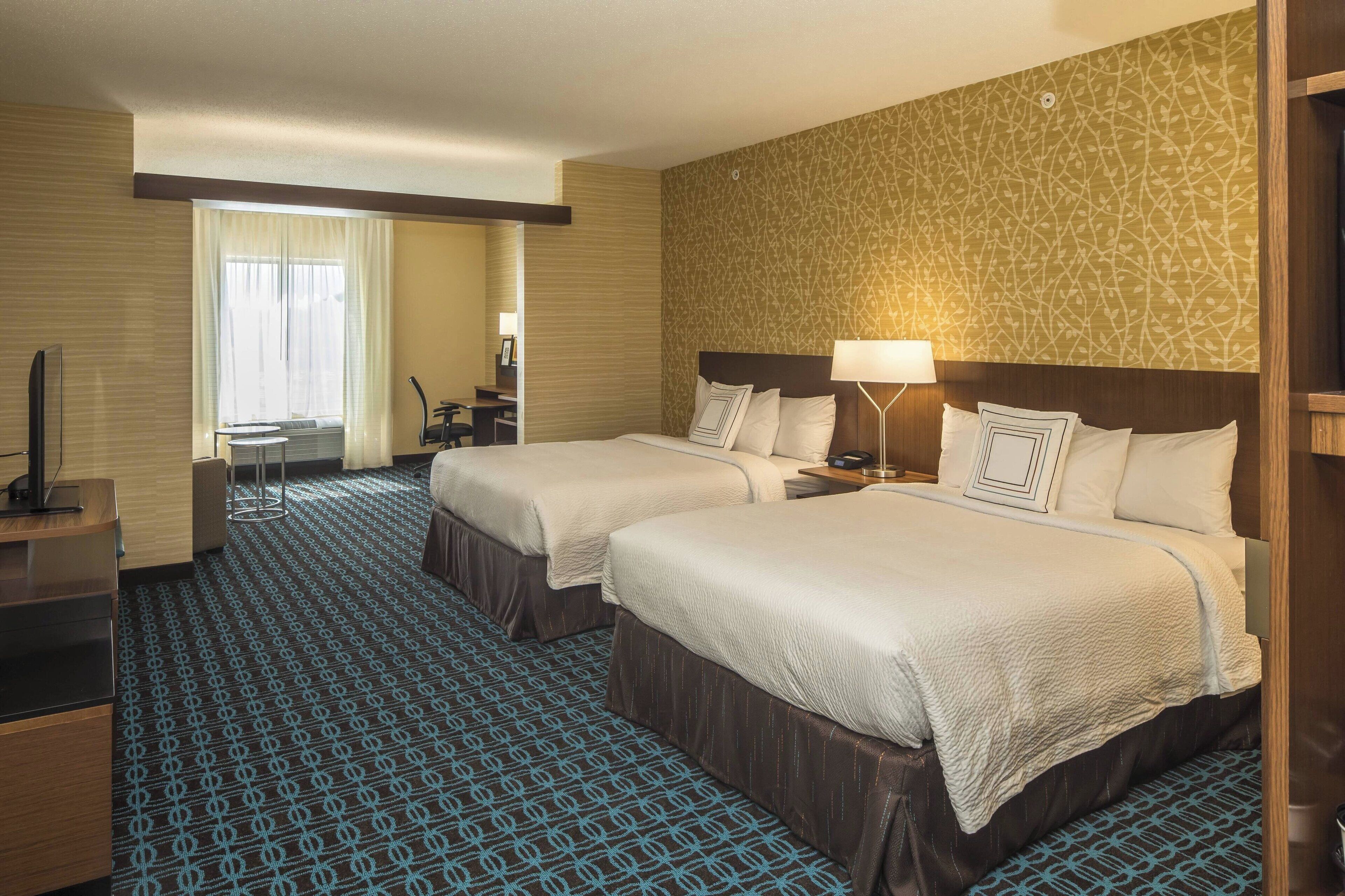 suite, multiple beds | in-room safe, desk, blackout curtains, iron/ironing board