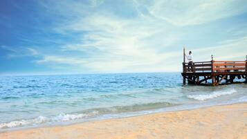 Privat strand, parasoller och strandhanddukar