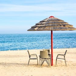 Private beach, beach umbrellas, beach towels
