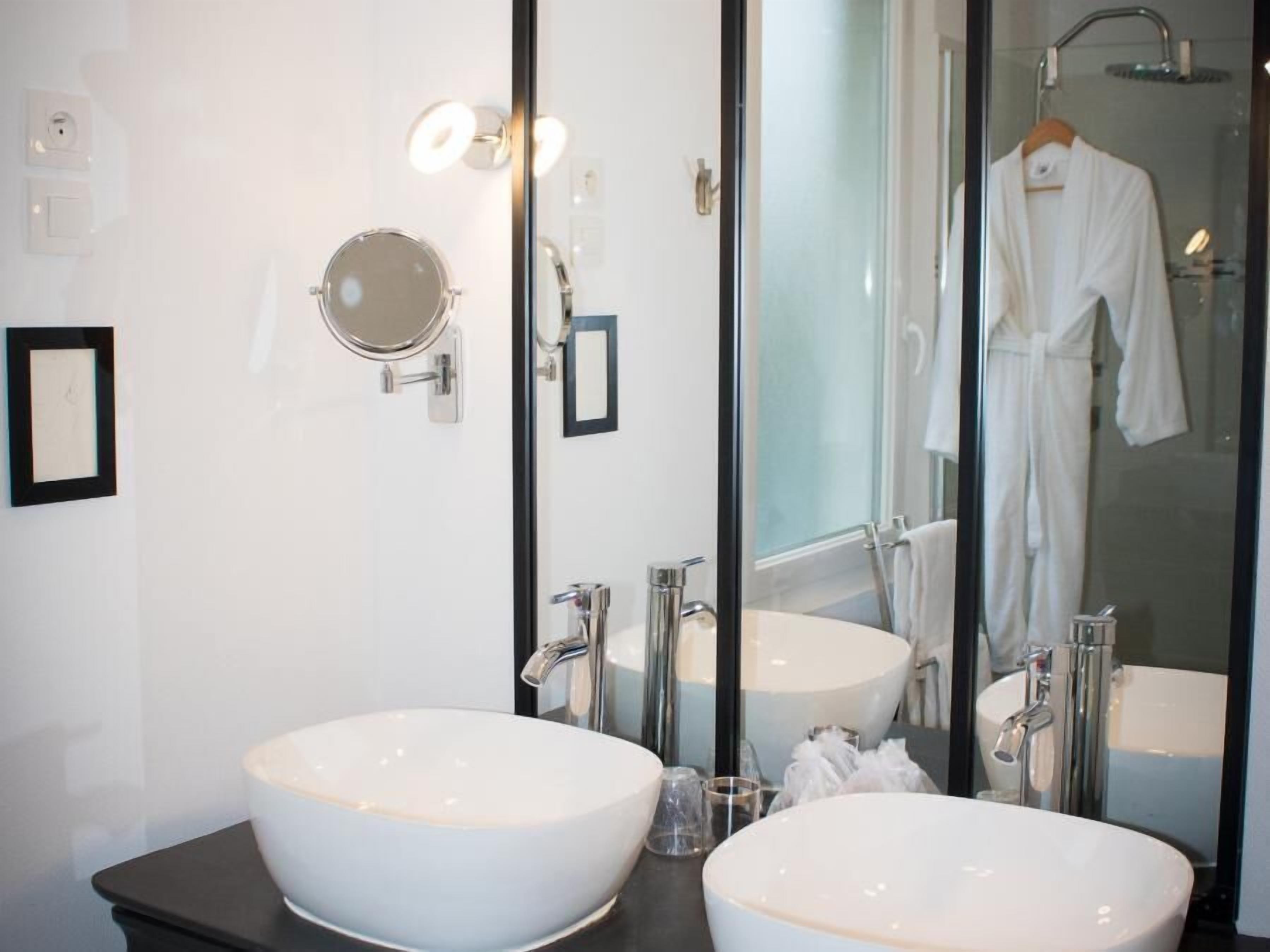 romantic suite, ensuite (canelle) | bathroom | hair dryer, bathrobes, towels, soap
